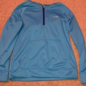 Champion, light blue hoodie.